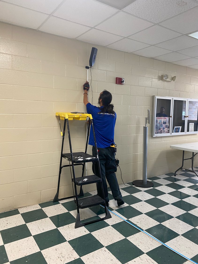 Installation techs from USUV Clean, LLC as they installed the last of MHS's UVC lights.