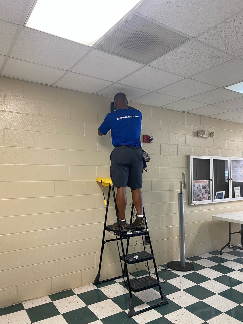 Installation techs from USUV Clean, LLC as they installed the last of MHS's UVC lights.