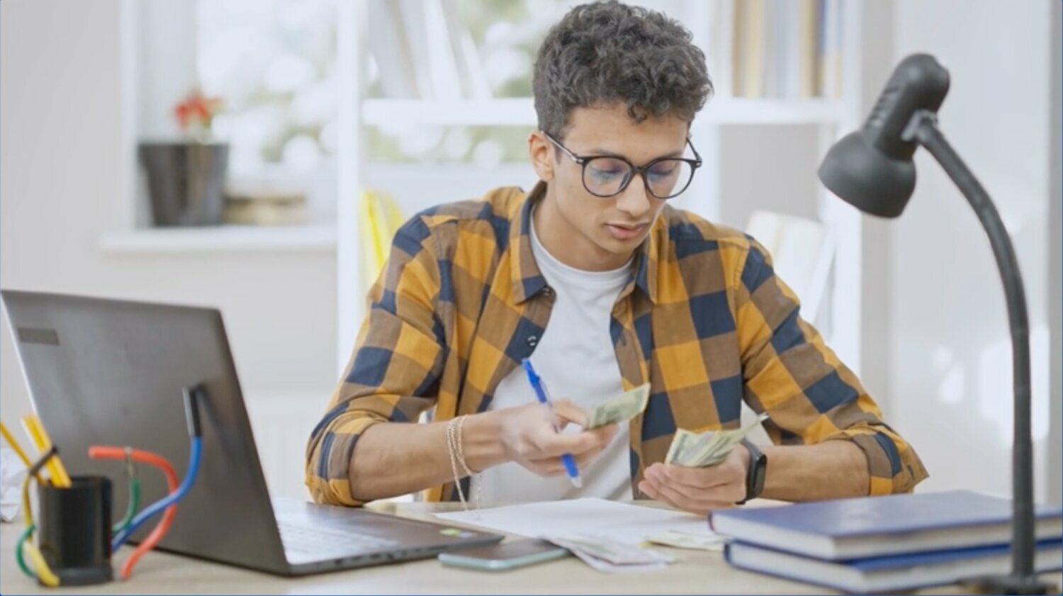 Teaching personal finance in high school has immediate benefits: Students learn to save more and spend less